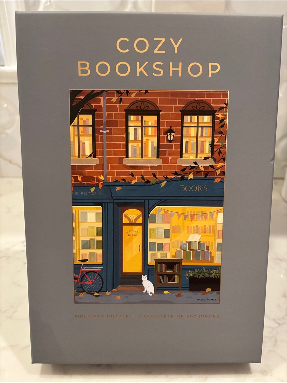 HOBBRY Cozy Bookshop 500-Piece Puzzle — Gray Box
